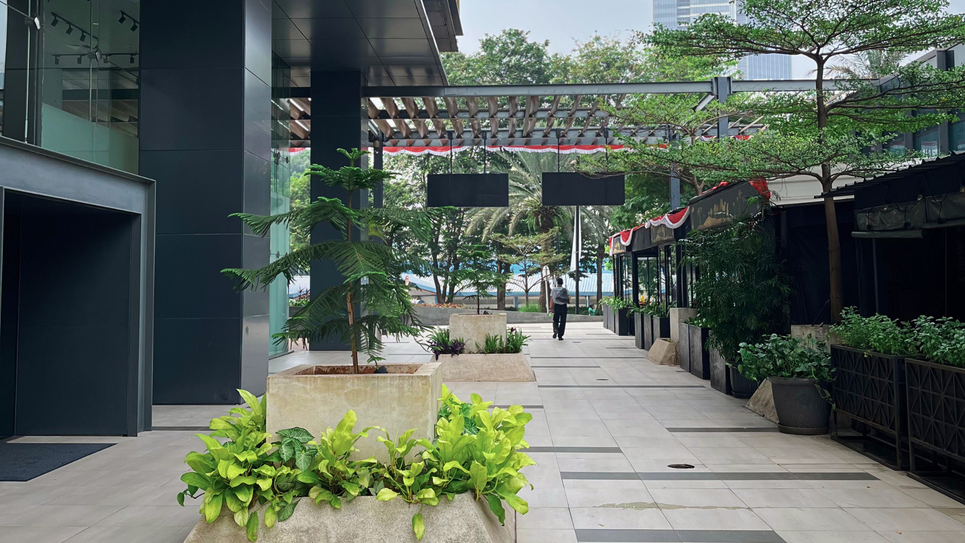 Pedestrian walkway and planter beds at Gran Rubina Business Park.